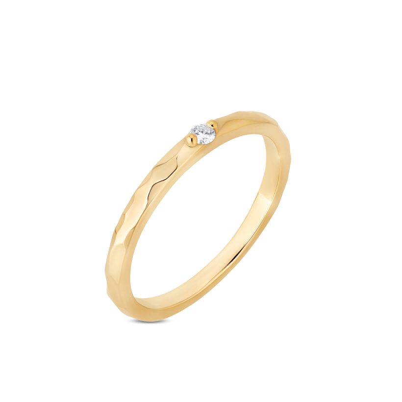Gold rock ring with a diamond